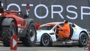 The Aston Martin Vantage driven by Allan Simonsen is seen after his crash. on June 22