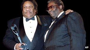 Bobby "Blue" Bland receives his award for the Rock and Roll Hall of Fame from B.B. King