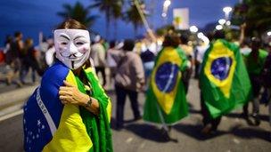 Demonstrators protest for better public services, a new political system and against the Brazilian PEC37 draft law, on Copacabana in Rio de Janeiro on June 23, 2013