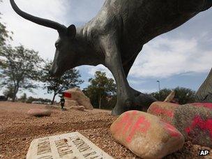 Memorial for Miguel Martinez next to a bull statue at the National Ranching Heritage Center, at Texas Tech University (25 June 2013)