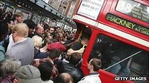 People getting on a bus