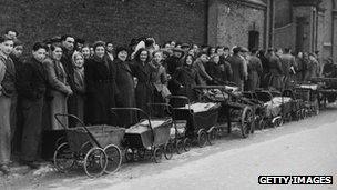 People queuing for coal