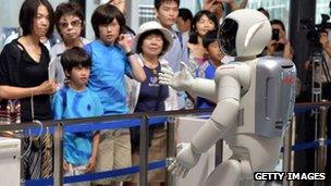 Human gestures perplex Asimo, Honda museum robot guide - BBC News