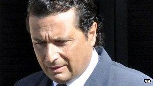 Capt Schettino leaving home for court, 14 May 2013