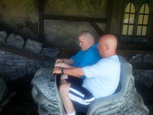 Mark Neary and Steven at a theme park