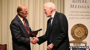 Prince Philip presents Sir Ian Wood with a Royal Medal during a medal presentation event at the Royal Society of Edinburgh on 12 August 2013 in Edinburgh