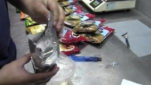 police searching food packets