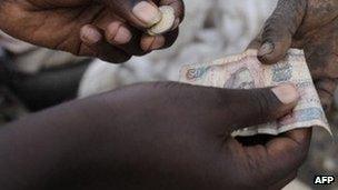 People passing money in Kenya