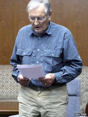 US citizen Merrill Newman reads from a piece of paper at an undisclosed location in this undated photo released by North Korea's Korean Central News Agency (KCNA) in Pyongyang on 30 November 2013