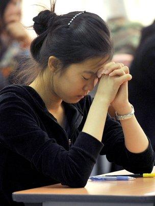 The anxious moments before a college entrance exam in Seoul