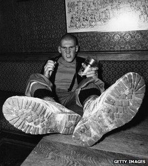 Circa 1978, a skinhead pictured in a pub