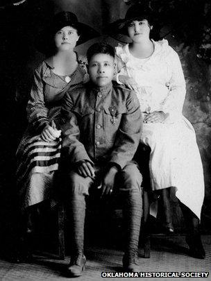 Choctaw code talker Joseph Oklahombi with family