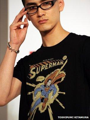man wearing a superman t-shirt