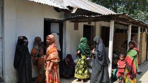 Village women waiting outside the clinic