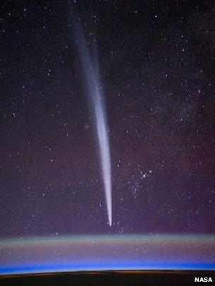 Comet Lovejoy visible near Earth’s horizon (c) Nasa