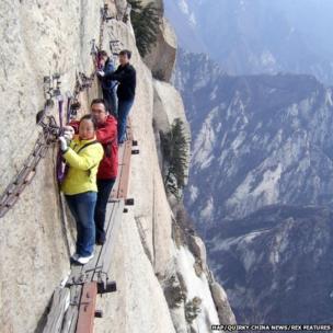 World's scariest walkway? Tourists brave Chang Kong Cliff Road in China ...