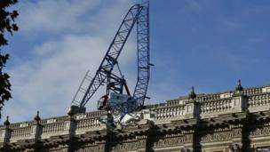 england storm batters wales collapsed crane whitehall cabinet office