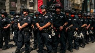 Police in New York City in formation near a protest in Times Square (1 June)