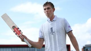England opener Zak Crawley raises his bat as he walks off after hitting 189 against Australia