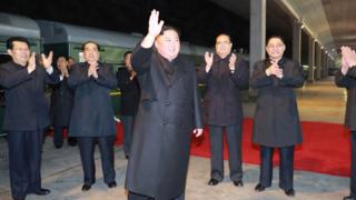 Kim Jong-un boards a private train, ahead of an expected summit with Russian President Vladimir Putin on Thursday