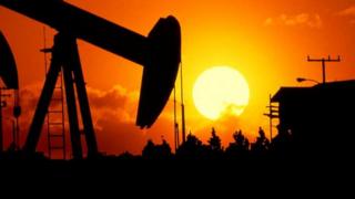 oil pump at sunset