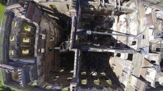 Aerial view of burnt-out mansion