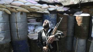 Syrian rebel fighter in the town of Arbin in the eastern Ghouta region on the outskirts of capital Damascus, 26 February 2016