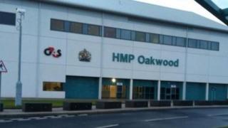 The entrance to HMP Oakwood