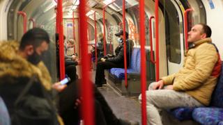 On a tube train in London