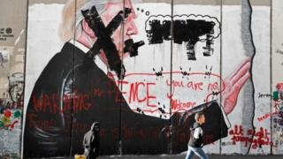"Pence you are not welcome", says graffiti in the West Bank city of Bethlehem