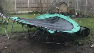 UGC image showing a trampoline lying in a garden