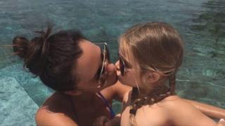 Victoria Beckham kissing Harper