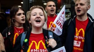 Lauren McCourt protesting outside McDonald's