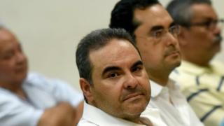 Former Salvadoran President (2004-2009) Elias Antonio Saca waits for the judge to arrive in court in San Salvador, on November 1, 2016.