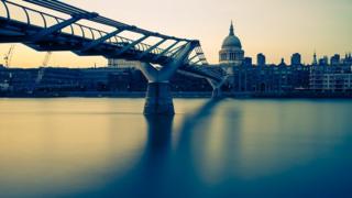 View of London, looking across the Thames, from the Millennium bridge to St Paul's Cathedral