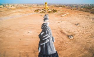 French artist Saype's Beyond Walls artwork of interlocking hands in Ouagadougou, Burkina Faso - Sunday 1 March 2020
