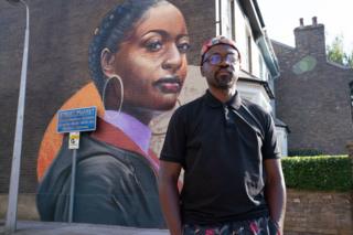 Dreph with EastEnders mural