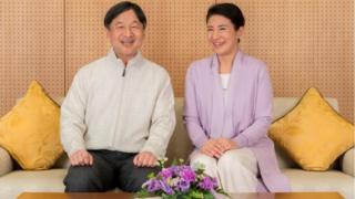 Japan's Crown Prince Naruhito and Crown Princess Masako smile at their residence, Togu Palace, in Tokyo