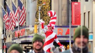 A participant waves to the crowd during the Macy's Thanksgiving Day Parade in Manhattan, New York, US, November 22, 2018