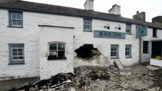 Hole in the Black Lion pub