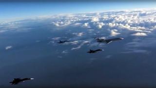 Russian footage of planes leaving Syria