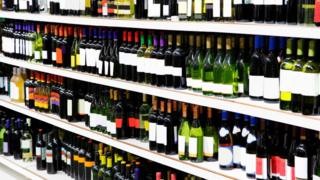 Bottles of wine on store shelves