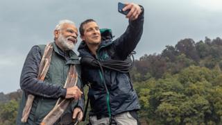 Bear Grylls takes a selfie with Indian leader Narendra Modi