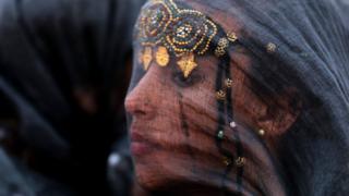 A Moroccan woman from the southern desert, wearing a traditional outfit in Tan-Tan, Morocco - Sunday 8 July 2018
