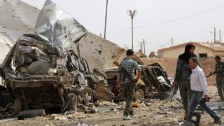 Aftermath of Islamic State (IS) bomb attack on Kurdish YPG checkpoint north of the city of Hassakeh, Syria (14 September 2015)
