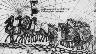 Các nhà buôn Catalonia (có lẽ là buôn lụa) trên đường từ phương Đông trở về trên Con đường Tơ lụa, tranh vẽ khoảng thời gian 1350. Hình ảnh từ tập bản đồ 'Catalan Atlas', 1375