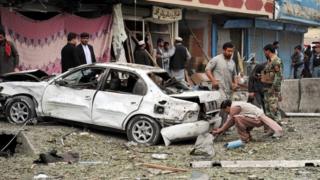 Afghan security officials inspect the scene of an attack by suspected militants at the Indian consulate in Jalalabad, Afghanistan, 02 March 2016