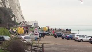 The man was airlifted to hospital after falling halfway down the cliff