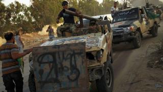 Des miliciens rentrent à Benghazi après avoir libéré la ville des mains d'autres forces rivales