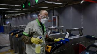 A man disinfects the subway in China